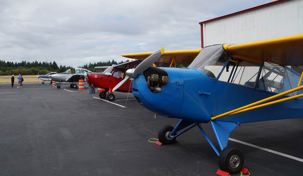 Several different color planes lined in a row.